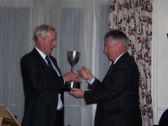chairman presents Winners Trophy to Paul Turner
